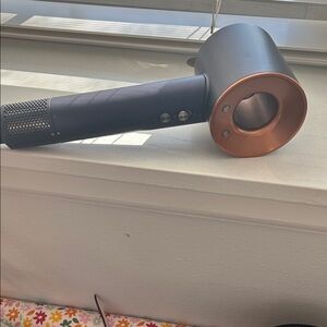 Dyson Supersonic Hair Dryer, Prussian Blue/Rich Copper, with attachments.